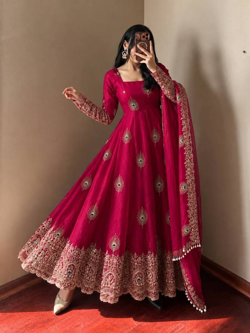 Rani pink peacock feather embroiderani pink silk gown with pant & dupatta