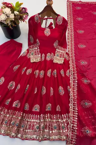 Rani pink peacock feather embroiderani pink silk gown with pant & dupatta