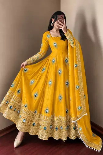 Yellow peacock feather embroidered silk gown with pant & dupatta