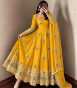 Yellow peacock feather embroidered silk gown with pant & dupatta