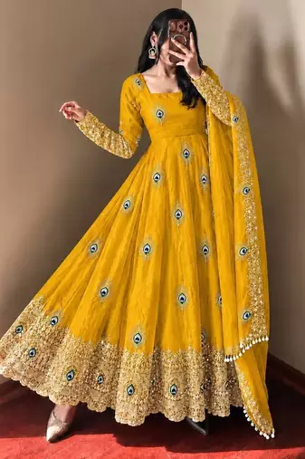 Yellow peacock feather embroidered silk gown with pant & dupatta