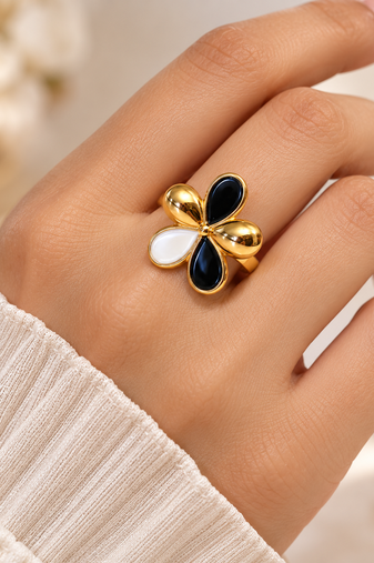 Gold-tone finish, glossy enamel petals, lightweight fit, flower design.
