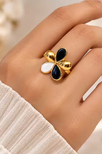 Gold-tone finish, glossy enamel petals, lightweight fit, flower design.