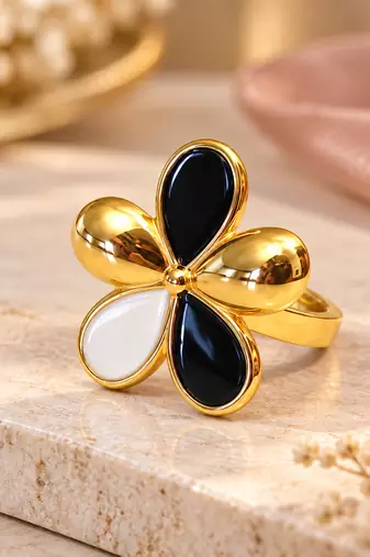 Gold-tone finish, glossy enamel petals, lightweight fit, flower design.