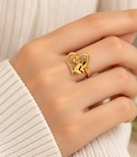 Dual heart design, polished finish, bold cocktail ring, romantic style.