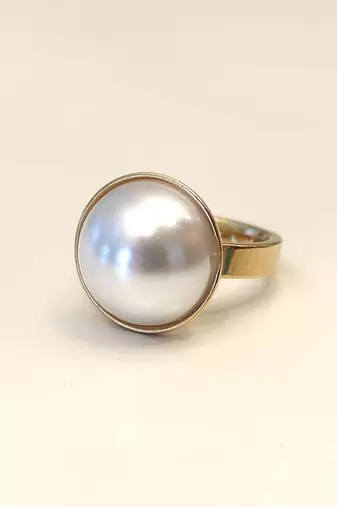 Stainless steel, anti-tarnish, hypoallergenic, gloss finish, fits most finger sizes