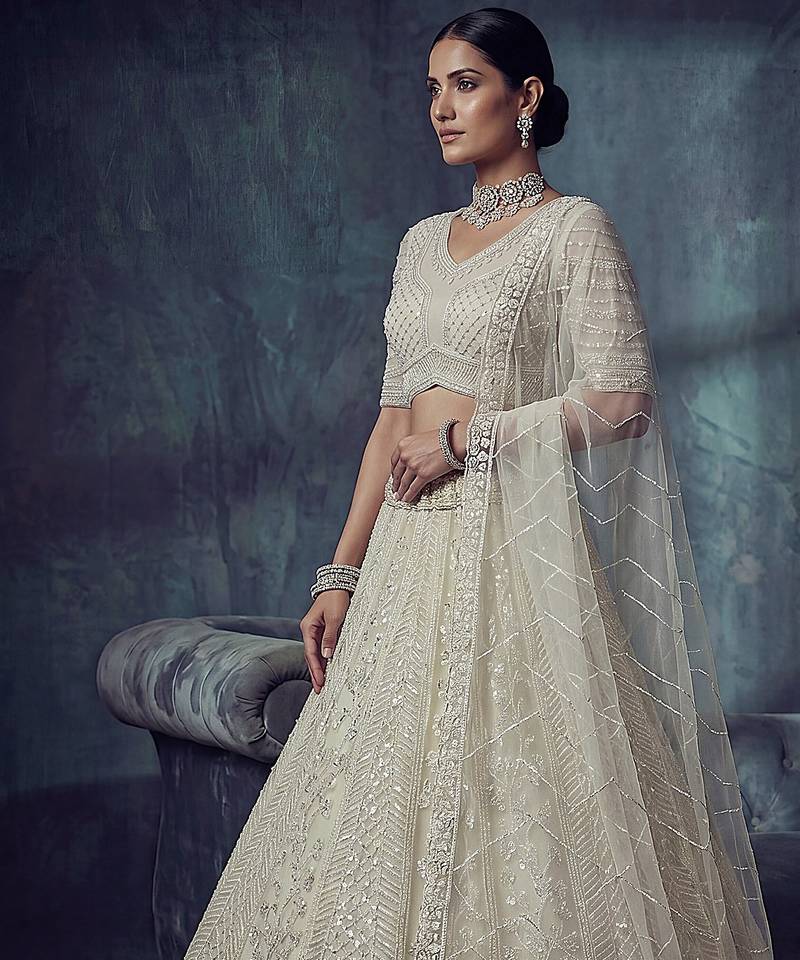 Ivory Designer Embroidery With Hand Work Net Semi Stitched Lehenga Set