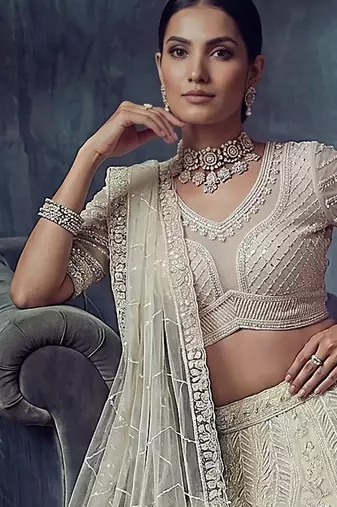 Ivory Designer Embroidery With Hand Work Net Semi Stitched Lehenga Set