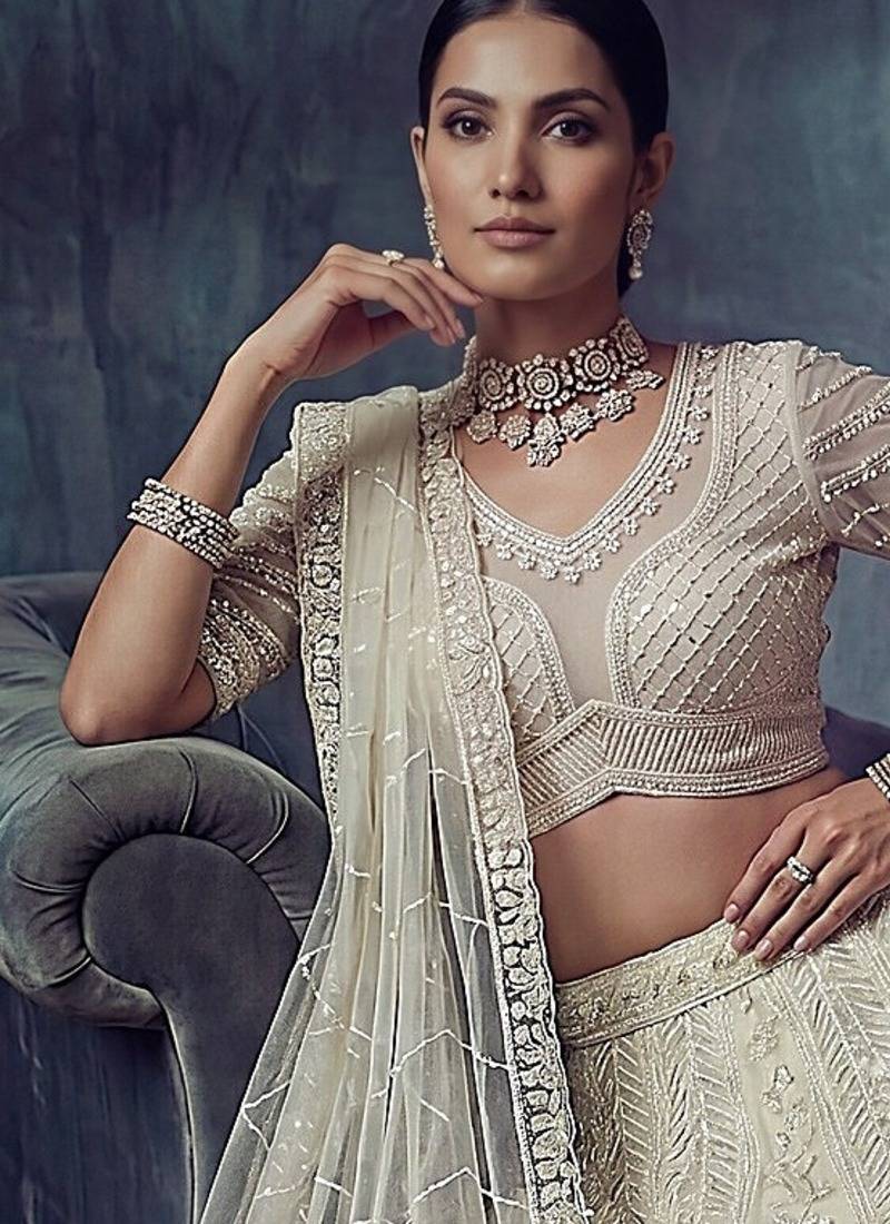 Ivory Designer Embroidery With Hand Work Net Semi Stitched Lehenga Set
