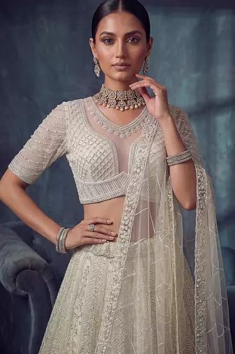 Ivory Designer Embroidery With Hand Work Net Semi Stitched Lehenga Set