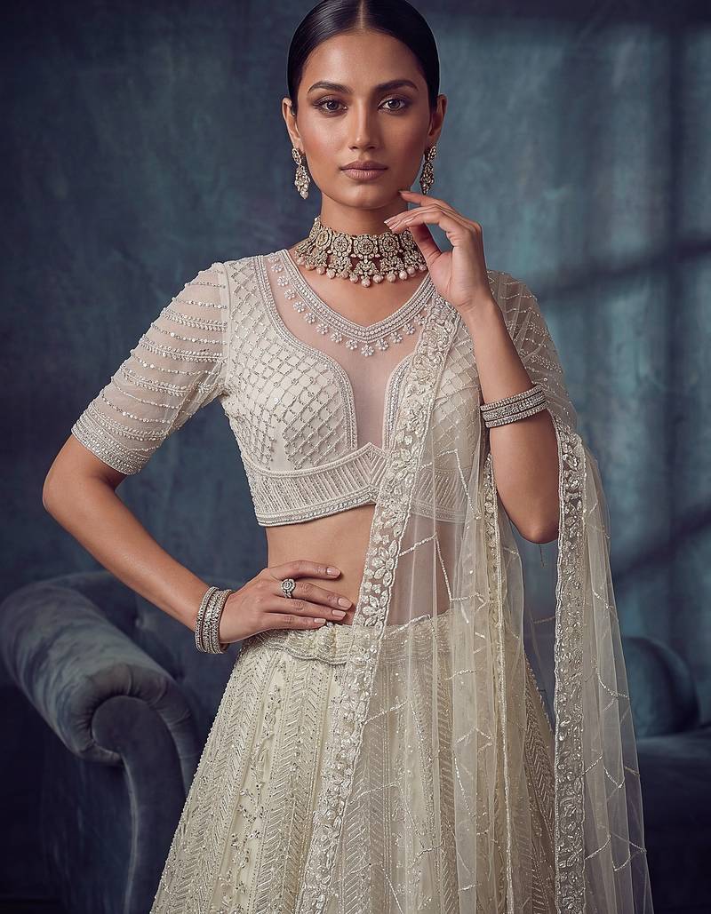 Ivory Designer Embroidery With Hand Work Net Semi Stitched Lehenga Set