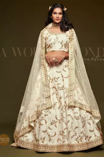 Off White Thread Embroidered & Sequins Silk Blend Semi Stitched Lehenga Set