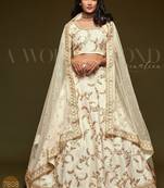 Off White Thread Embroidered & Sequins Silk Blend Semi Stitched Lehenga Set