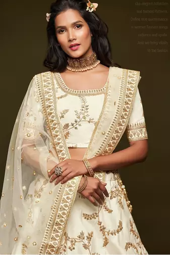 Off White Thread Embroidered & Sequins Silk Blend Semi Stitched Lehenga Set