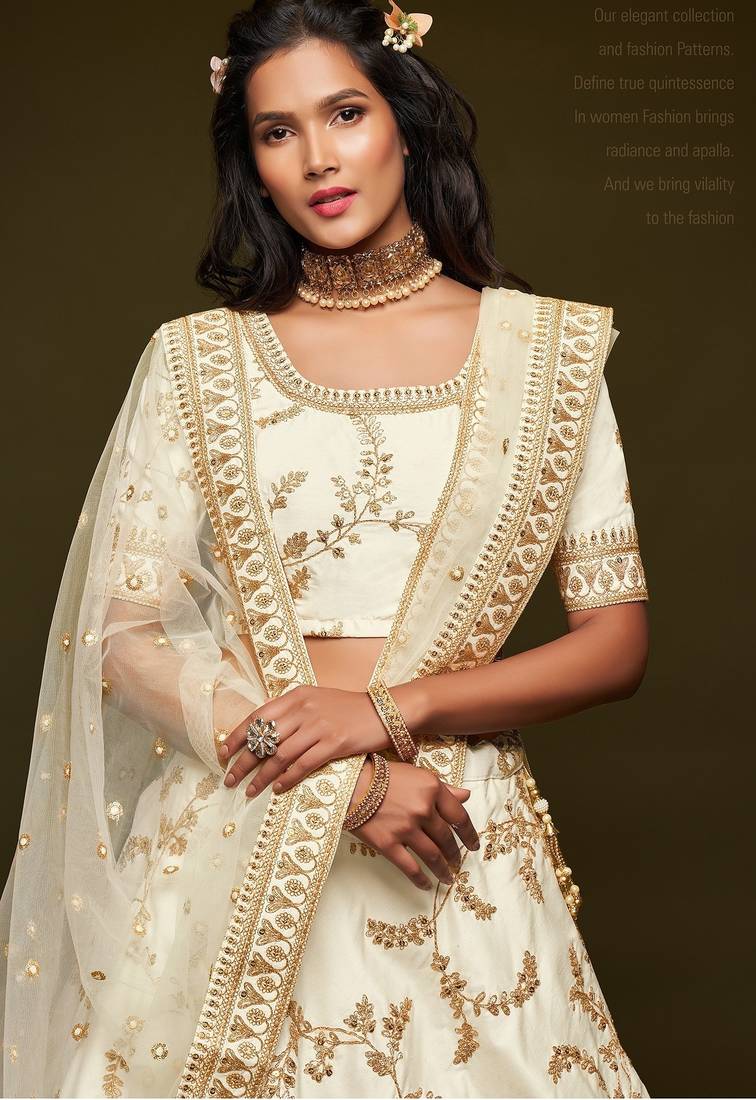 Off White Thread Embroidered & Sequins Silk Blend Semi Stitched Lehenga Set