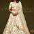 Off White Thread Embroidered & Sequins Silk Blend Semi Stitched Lehenga Set