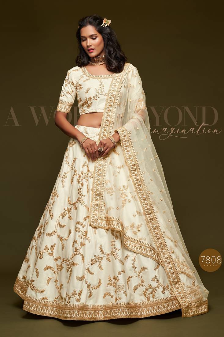 Off White Thread Embroidered & Sequins Silk Blend Semi Stitched Lehenga Set