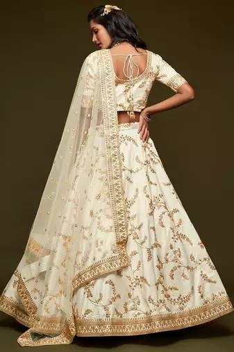 Off White Thread Embroidered & Sequins Silk Blend Semi Stitched Lehenga Set