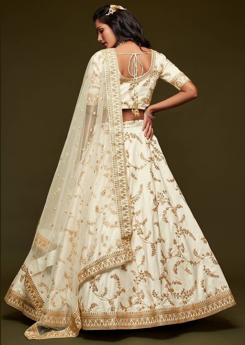 Off White Thread Embroidered & Sequins Silk Blend Semi Stitched Lehenga Set