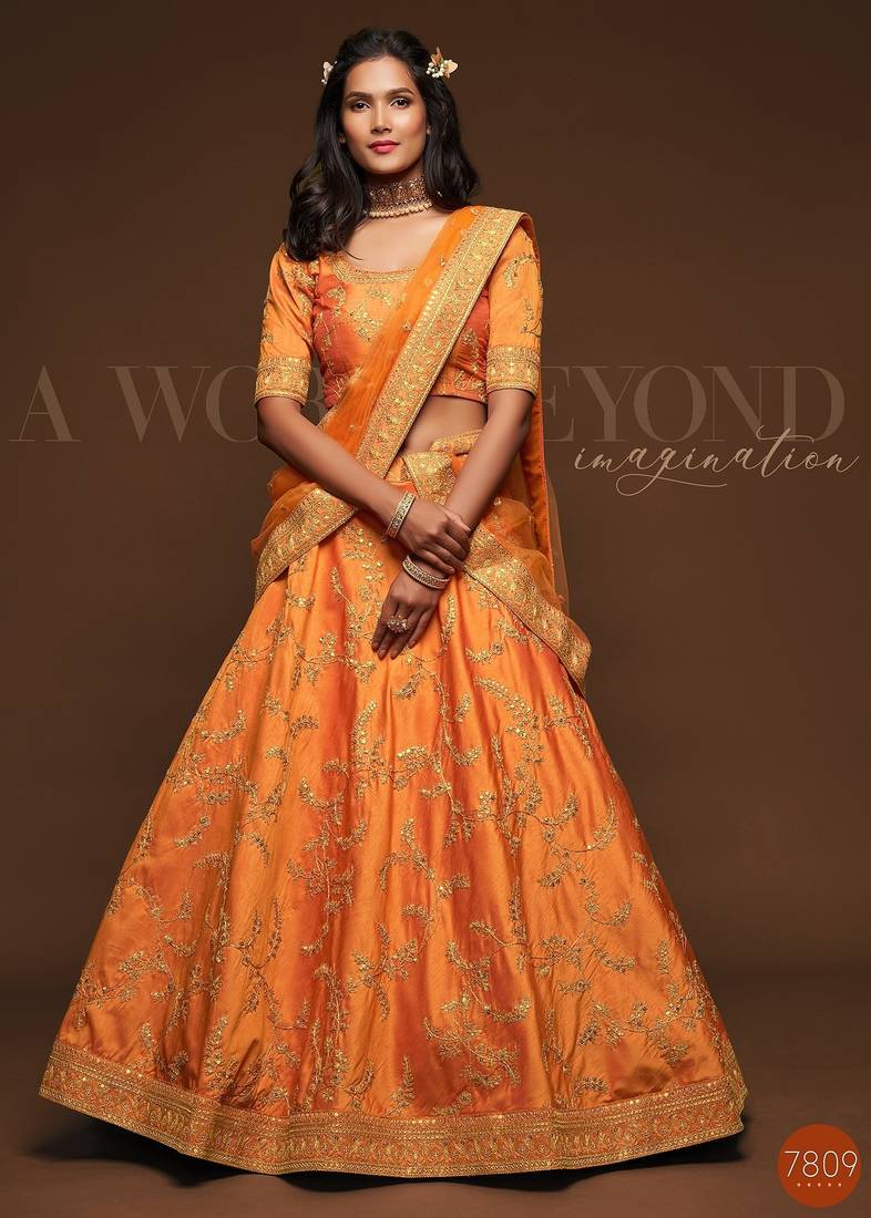 Orange Thread Embroidered & Sequins Silk Blend Semi Stitched Lehenga Set