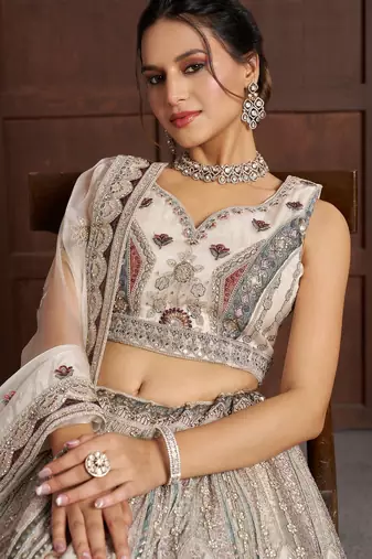 White Designer Embroidery With Hand Work Net Semi Stitched Lehenga Set