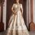 Cream Designer Embroidery With Hand Work Silk Blend Semi Stitched Lehenga Set