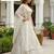 White Jari Dori Thread Sequence Embroidery With Zircon Diamond Work Bridal Net Semi Stitched Lehenga Set