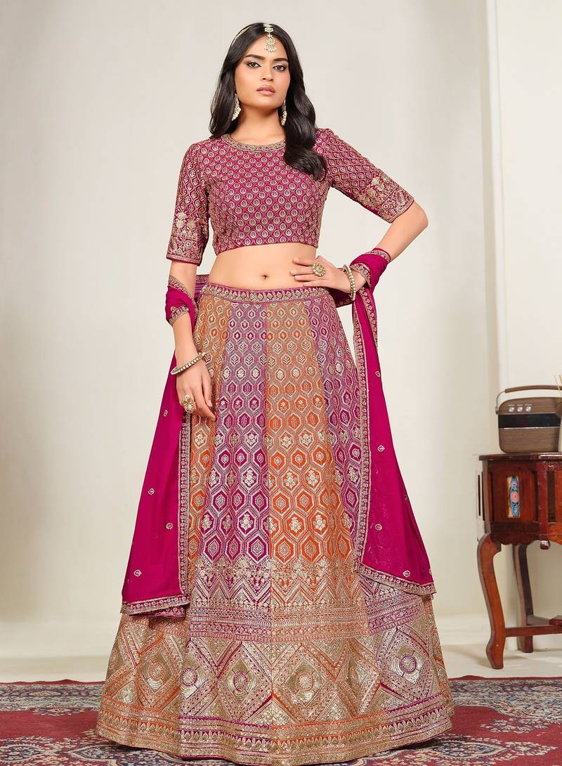 Pink & Orange Zari And Sequins Embroidery Work Faux Georgette Semi Stitched Lehenga Set