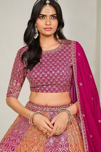 Pink & Orange Zari And Sequins Embroidery Work Faux Georgette Semi Stitched Lehenga Set