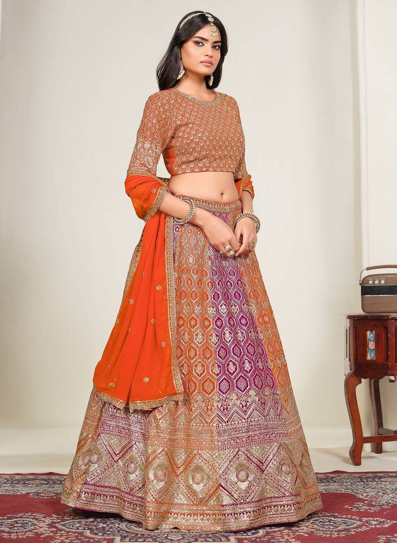 Pink & Orange Zari And Sequins Embroidery Work Faux Georgette Semi Stitched Lehenga Set