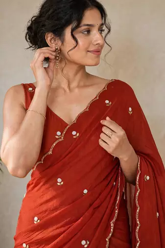 Partywear crush saree with handwork flower butti and contrast border