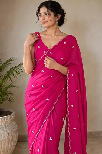 Partywear crush saree with elegant flower butti handwork and statement border