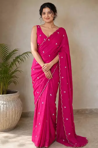 Partywear crush saree with elegant flower butti handwork and statement border