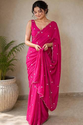 Partywear crush saree with elegant flower butti handwork and statement border