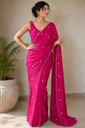 Partywear crush saree with elegant flower butti handwork and statement border
