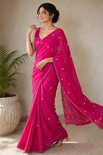 Partywear crush saree with elegant flower butti handwork and statement border