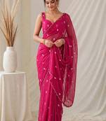 Partywear crush saree with elegant flower butti handwork and statement border