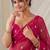 Partywear crush saree with elegant flower butti handwork and statement border