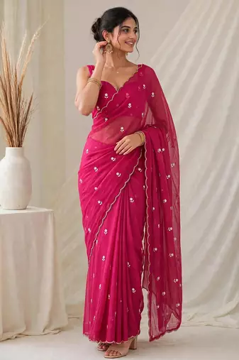Partywear crush saree with elegant flower butti handwork and statement border