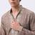 Brown salsa fabric kurta with lachaka fabric bootcut pants, ethnic partywear ensemble.