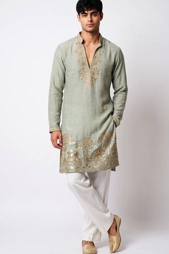 Green salsa fabric kurta with lachaka fabric bootcut pants, ethnic partywear ensemble.
