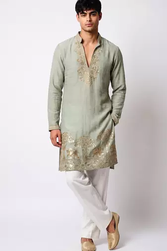 Green salsa fabric kurta with lachaka fabric bootcut pants, ethnic partywear ensemble.