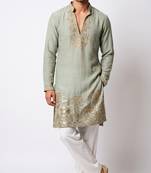 Green salsa fabric kurta with lachaka fabric bootcut pants, ethnic partywear ensemble.