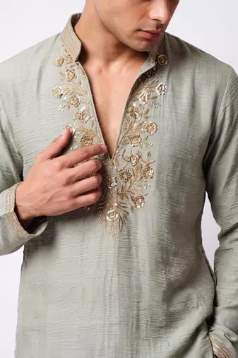Green salsa fabric kurta with lachaka fabric bootcut pants, ethnic partywear ensemble.
