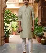 Buy elegant light green silk men's kurta set with off-white pants