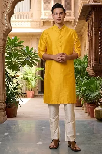 Buy elegant yellow silk men's kurta set with off-white pants