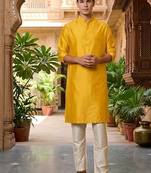 Buy elegant yellow silk men's kurta set with off-white pants