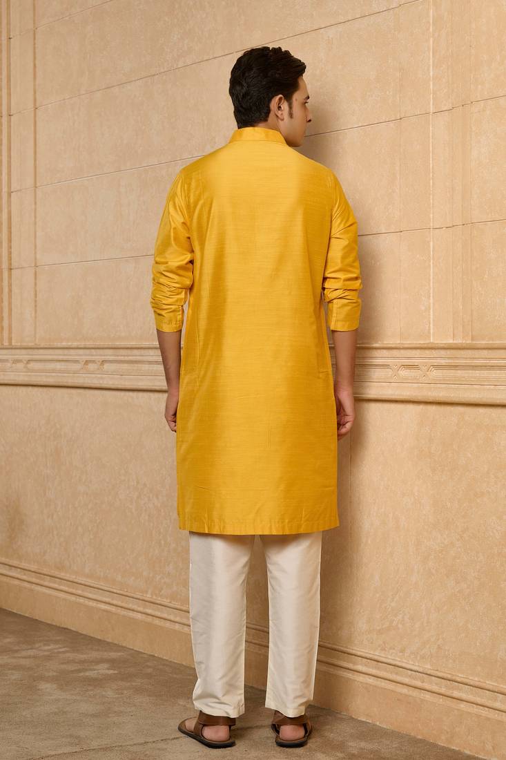Buy elegant yellow silk men's kurta set with off-white pants