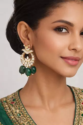 Gold plated green kundan earrings