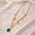 Gold plated green kundan layered necklace